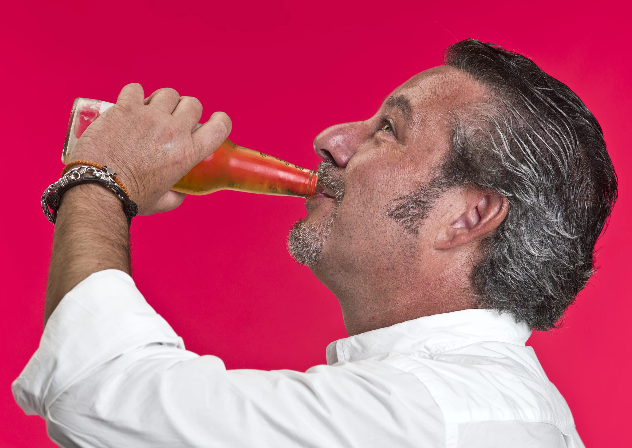Mature man having a beer